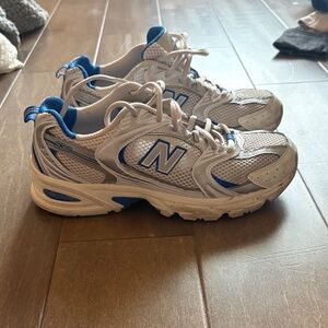 New Balance White and Blue Sneakers
